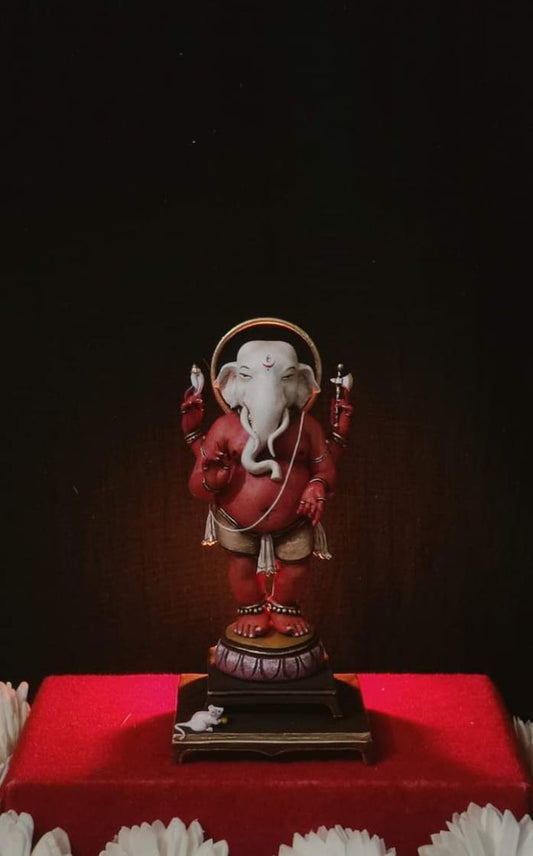 "Red and White Ganesh Idol Statue for Home Decor and Puja - Handcrafted with Intricate Details, Perfect for Ganesh Chaturthi and Other Festive Celebrations"